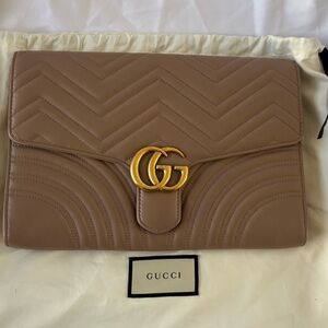 Gucci GG Marmont Matelassé Leather Clutch.